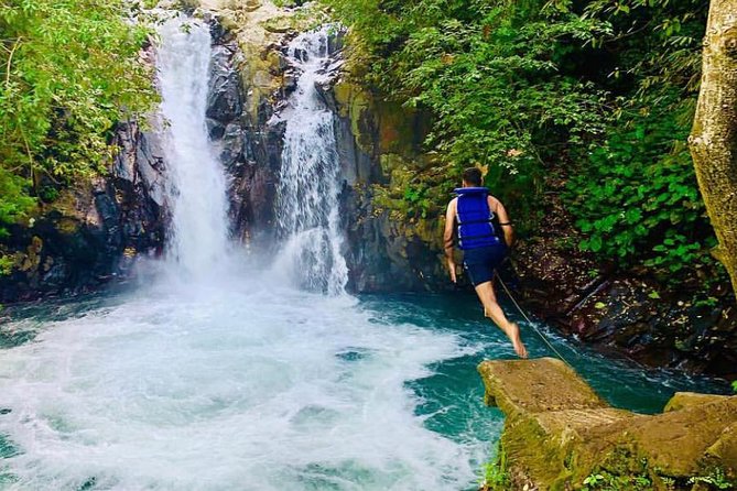 All Inclusive : Jumping Sliding at Aling- Aling Waterfall - Handara Gate - Lunch - Handara Iconic Gate: the short stop that still delivers
