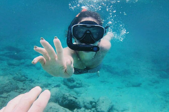 Bali Snorkeling at Blue Lagoon with Transport and Lunch - The boat ride and the reality of conditions (clear water isn’t guaranteed)