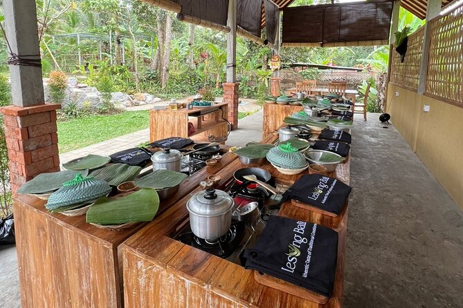 Balinese Cooking Class with Traditional Market Tour - Traditional compound open kitchen: learning in the setting, not a staged classroom