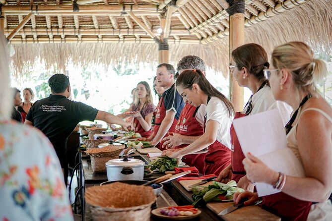 Balinese Farm Cooking Class by Pemulan Bali - Organic farm picking and the open-air kitchen setup