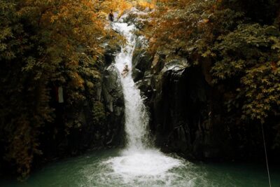 Cliff Jumping and Sliding at Aling Aling Waterfall - Cengana Rice Fields and a Balinese Home Stop for Fruit