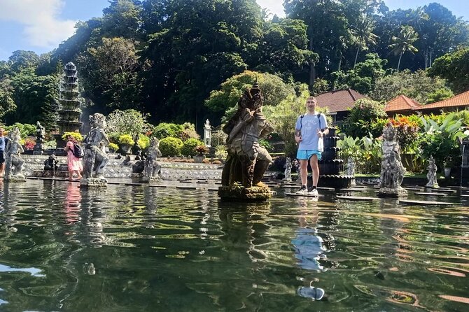Full-Day Private Tour in Gate of Heaven and East Bali - Ujung Water Palace (Lahangan Sweet): Fish Ponds and Old Palace Architecture