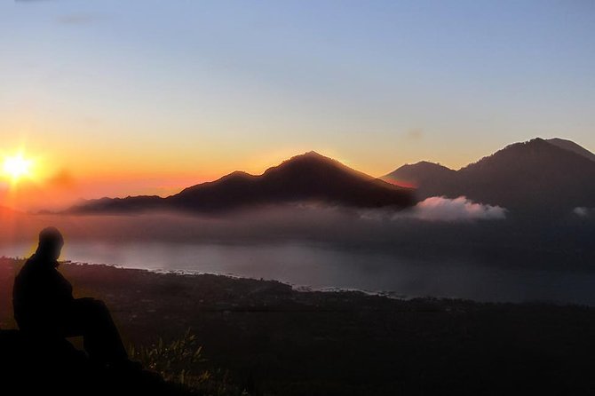 Mount Batur Sunrise Trekking Private All Inclusive - Hike basics: flashlight walking, black sand, and guide pacing